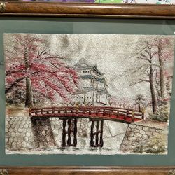  vintage Japanese silk embroidery artwork, often referred to as "Bunka" embroidery, depicting a traditional Japanese landscape with a red bridge, cher