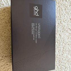 GHD unplugged Styler .. 
