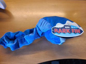 Wearable dog toy shark fin