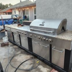 BBQ Greel, Refrigerator, Sink And Counter Top. 