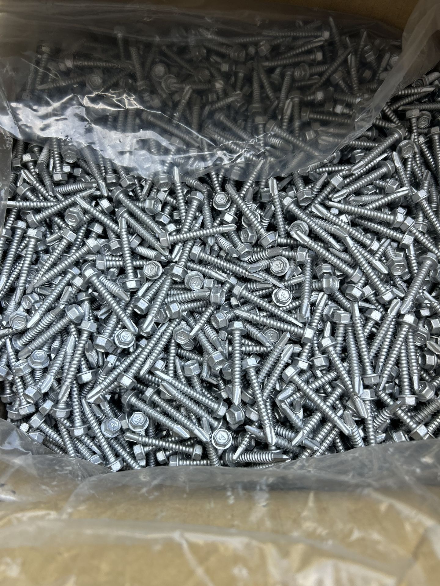 Steel Roofing Caulk & Installation Screws