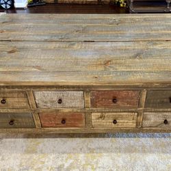 rustic reclaimed wood storage coffee table (also sometimes called a trunk coffee table or lift-top storage chest).
