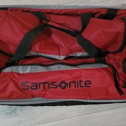 Samsonite Red and Black Rolling Duffel Bag