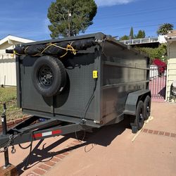 2025 GM Dump Trailer with Electric Lift  Clean, lightly used ready to work.