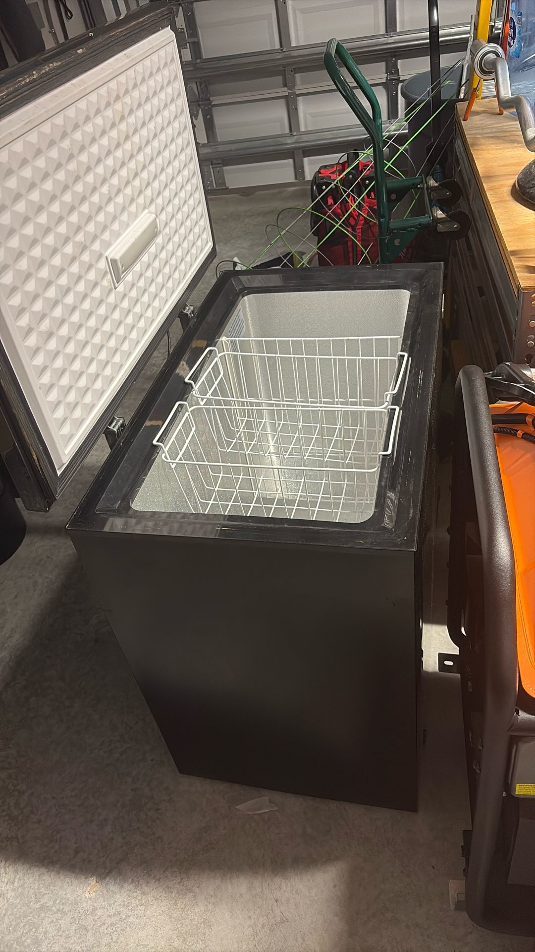 Black ,Magic Chef reach in freezer
