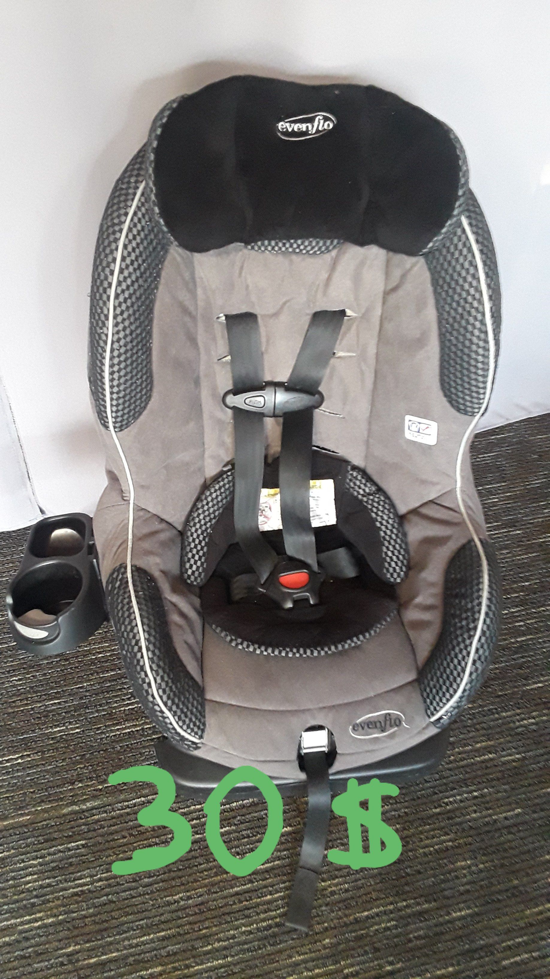 Car seat Evenflo with cup holder.