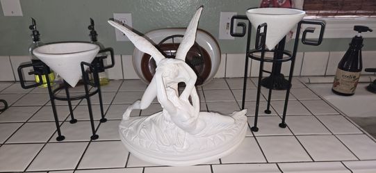 Home deco one statue and two candlestick holders