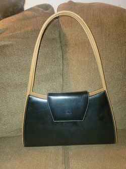A Black And Brown Gucci Vintage Purse