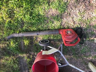 Toro Electric leaf blower. Not much muscle! But it works.