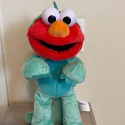 Walking Elmo in Dino costume