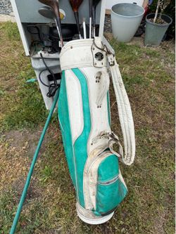 500 yrs old Grampa Gramma R.H. Golf set with real leather bags