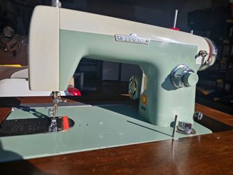 Vintage Belair sewing machine with cabinet