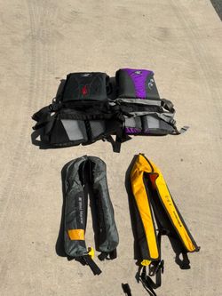 4 life vests PFDs