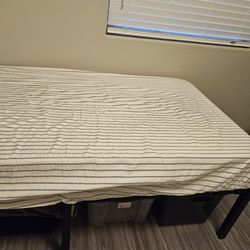 Normal use Twin Frame With Matress Foam Design.  Great condition.