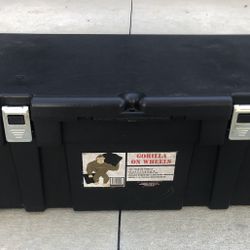  black, plastic, wheeled, “Gorilla on Wheels” footlocker