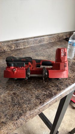 This is a Hilti SB 4-22 22V cordless band saw designed for cutting metal struts, pipes, and thread rods.