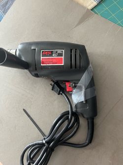 SKIL Standard Duty 120V, 3/8-inch Corded Drill with a side handle & Chuck Key. Model 457