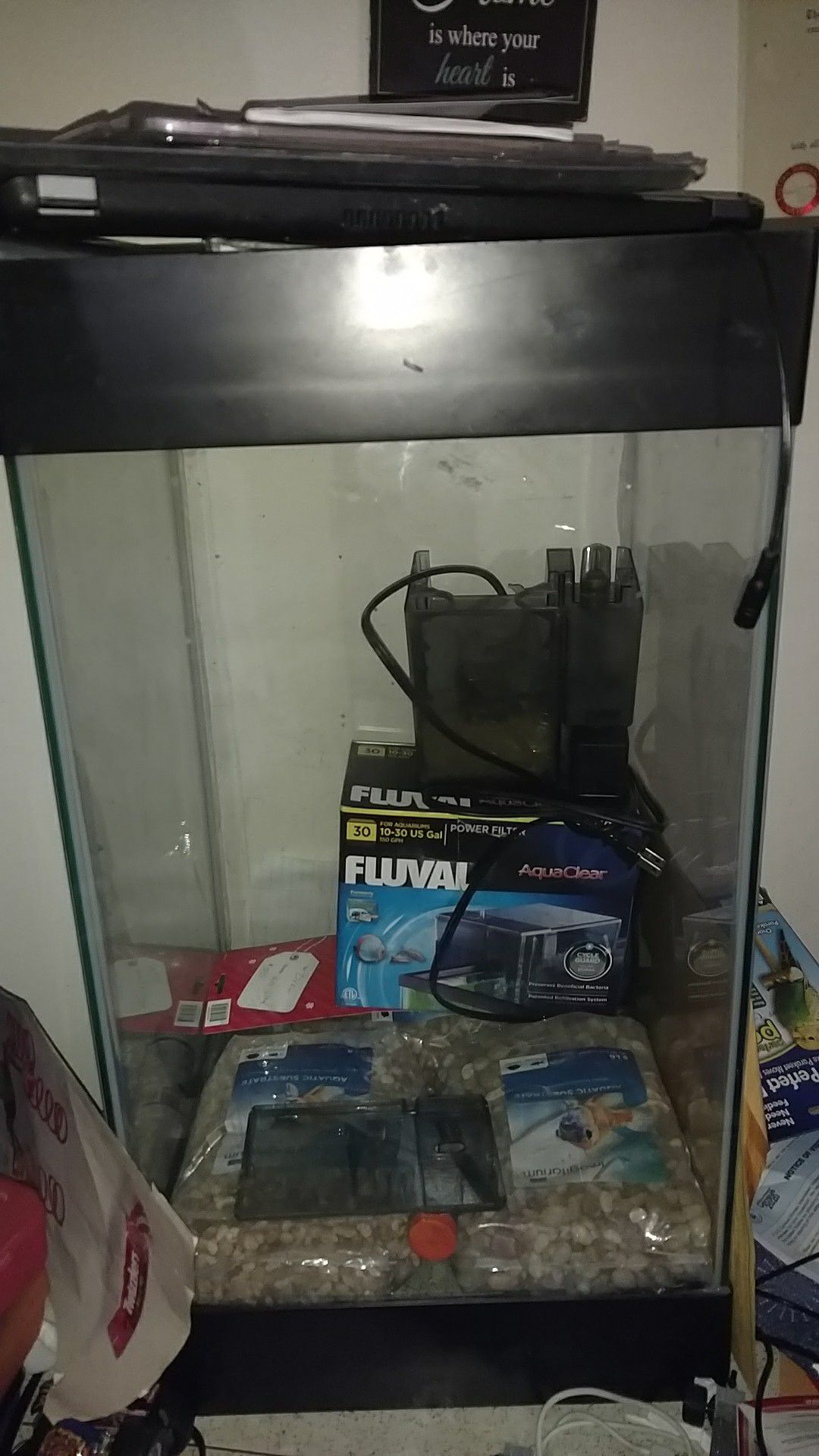 Brand new 30 gallon tank with brand new filter and 3 bags of rocks
