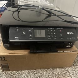 EPSON NX530