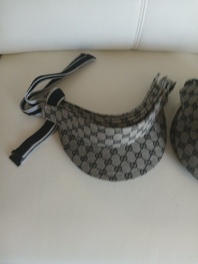 10  Brand new Gucci sun visor hat $70 each if you wanna buy everything we can work it out 