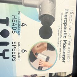 New Massager Gun With 4 Heads And 6 Speeds