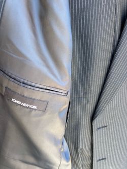 Jones New York two piece suit. Black pin stripe.  Great condition. I’m 5’5” 160 lbs