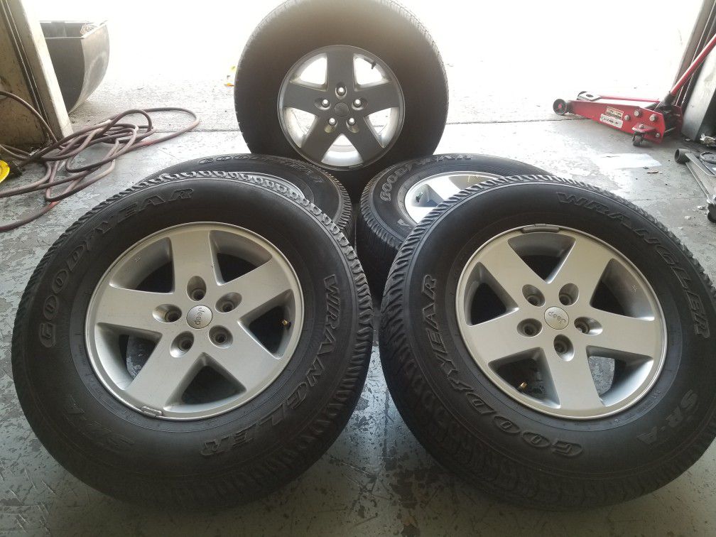 Jeep Wrangler Oem Wheels with tires