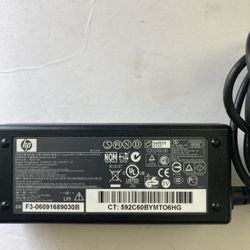 Genuine HP 65W AC adapter. Imput:100-240V. Output:18.5V, 3.5A