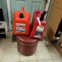 Two Plastic 5 Gallon Gas Can