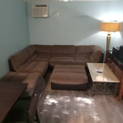 Sectional Brown cloth couch.