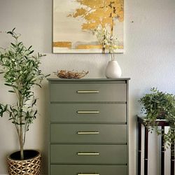 Sage green modern dresser with gold hardware 