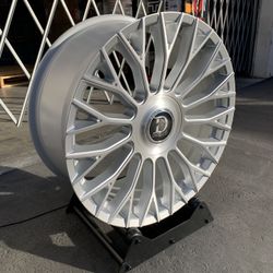 22x9.5 Dolce Roma silver brushed wheels