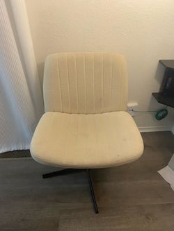 Cream Fabric Armless Swivel Chair