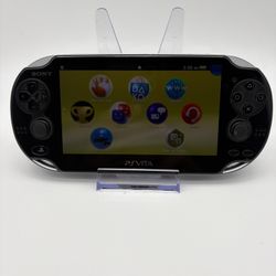 Sony PlayStation Vita PCH-1001 Black (INCLUDES 4GB MEMORY STICK/ CHARGER