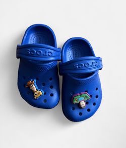 Blue Crocs Clogs with Toy Story Jibbitz