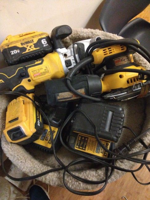Dewalt Cordless Saw And Batteries And Charging Stations 