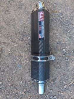 Yoshimura TRS carbon fiber motorcycle exhaust muffler.