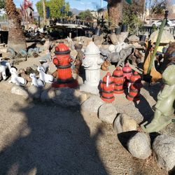 Concrete Fountains, Birdbaths And Clay Pottery. 