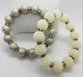 Set of 5 Bracelets. with Charms.