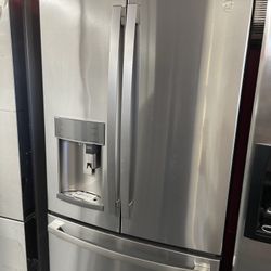 New Scratch And Dent GE 28 Cu Ft Stainless Steel French Door Fridge.  1 Year Warranty 