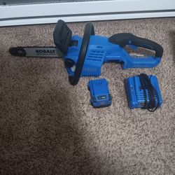 kobalt 24 volt cordless chain saw with 14" bar and charger and 1 battery brand new works great 