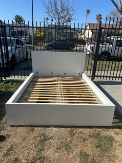 White IKEA malm queen bed frame