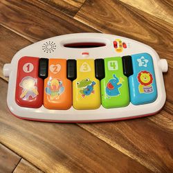 Fischer price kick n play piano baby toy
