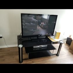 TV & Black Glass TV Stand