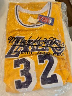 Mitchell & Ness Hardwood Classics Los Angeles Lakers basketball jersey. This yellow jersey is size 60