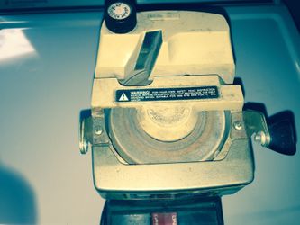 Wet stone sharpener