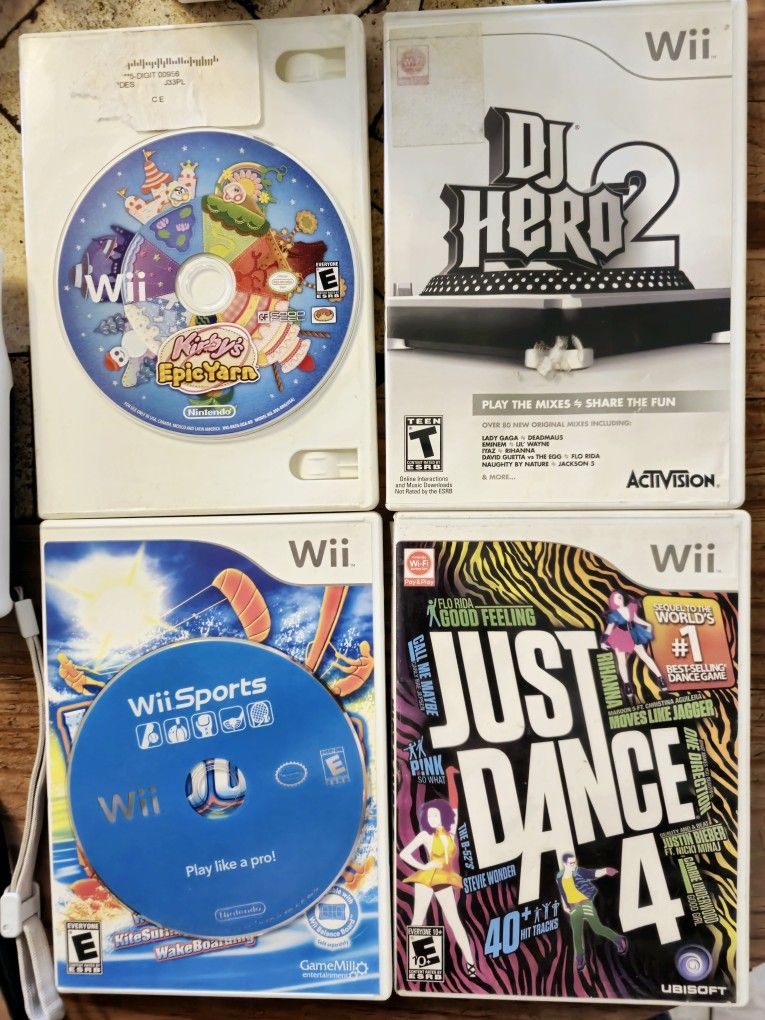 Wii Bundle. Wii Sports, Kirby, Just Dance, Controllers, Nunchucks