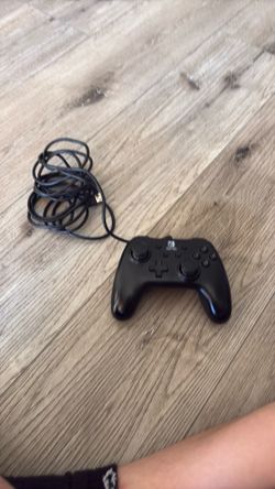 Black Nintendo switch controller (wired )