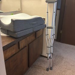 Adjustable crutches and leg elevation rest