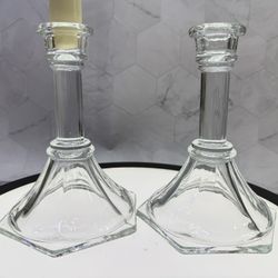 Set of (2) Vintage Homco clear glass candlestick holders, featuring a 6-inch height and a hexagonal base. Homco (Home Interiors & Gifts Inc).Clear gla